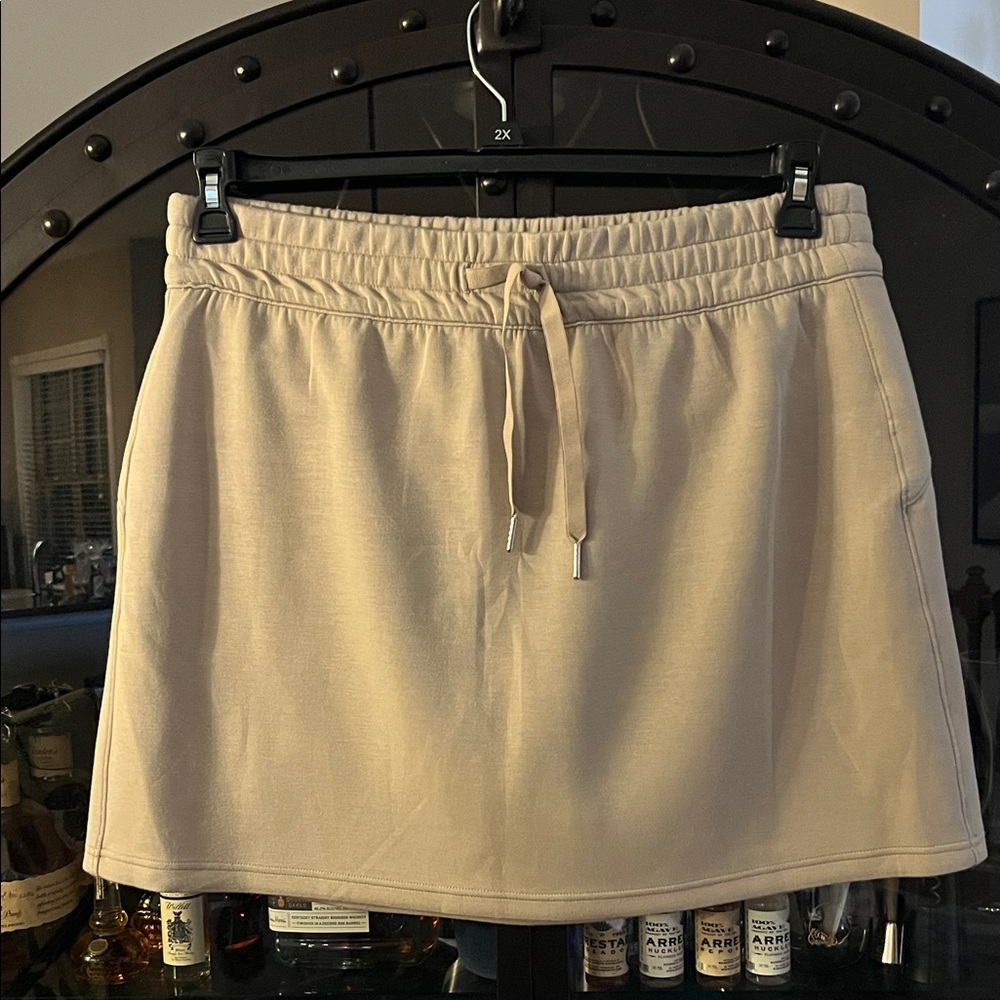SPANX Tan Skort to rock your walks, errands and life! Excellent condition!